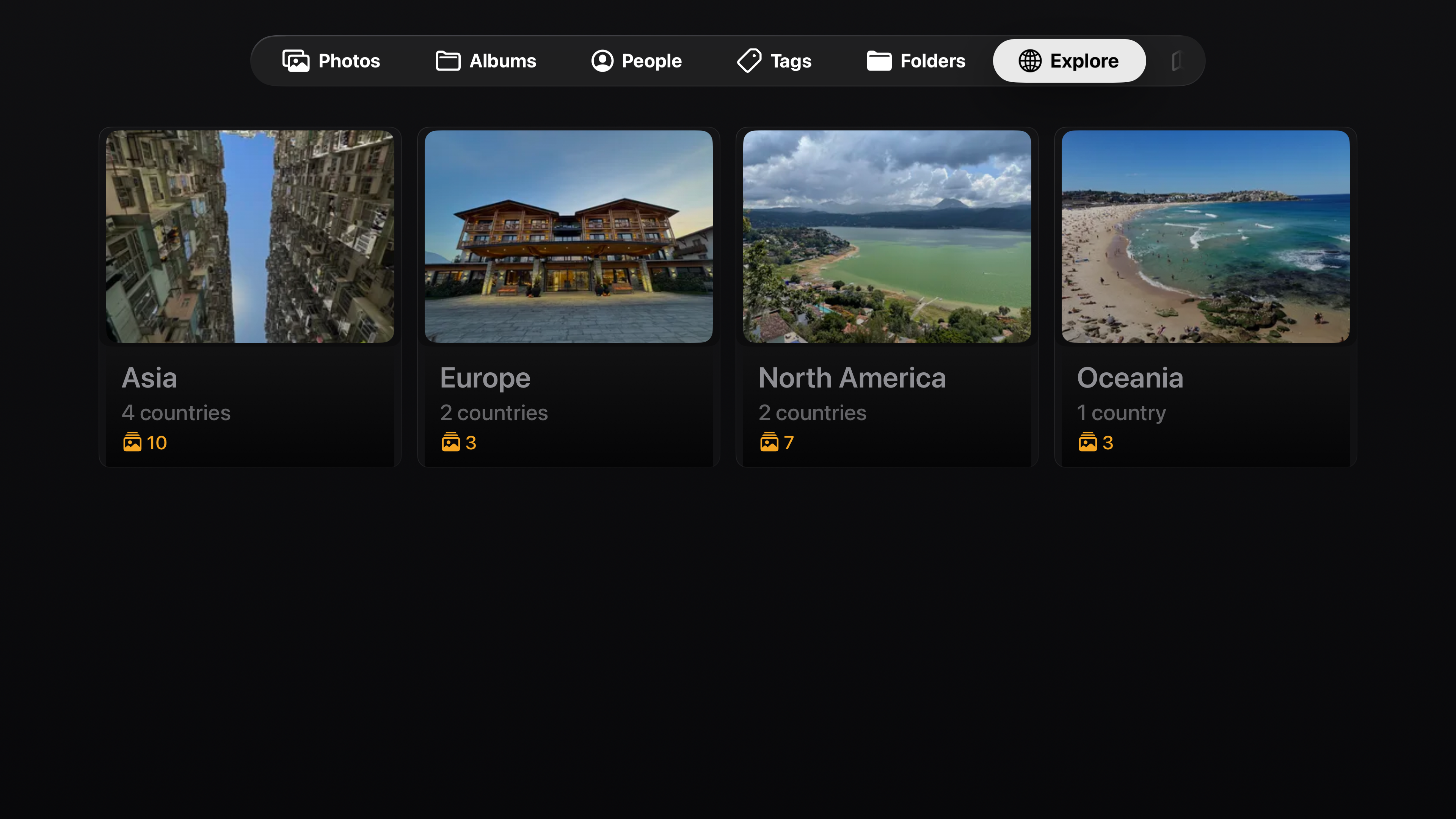 Explore photos by continent with location cards
